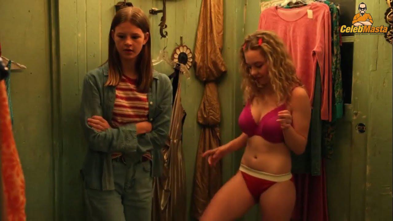 Sydney Sweeney nearly nude sheer outfit appearance. Sydney Sweeney revealing cleavage in just bra and panties showing her sexy curves.