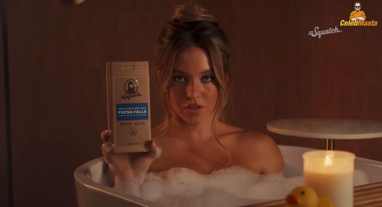 Sydney Sweeney nearly nude sheer outfit appearance. Sydney Sweeney revealing cleavage in just bra and panties showing her sexy curves.