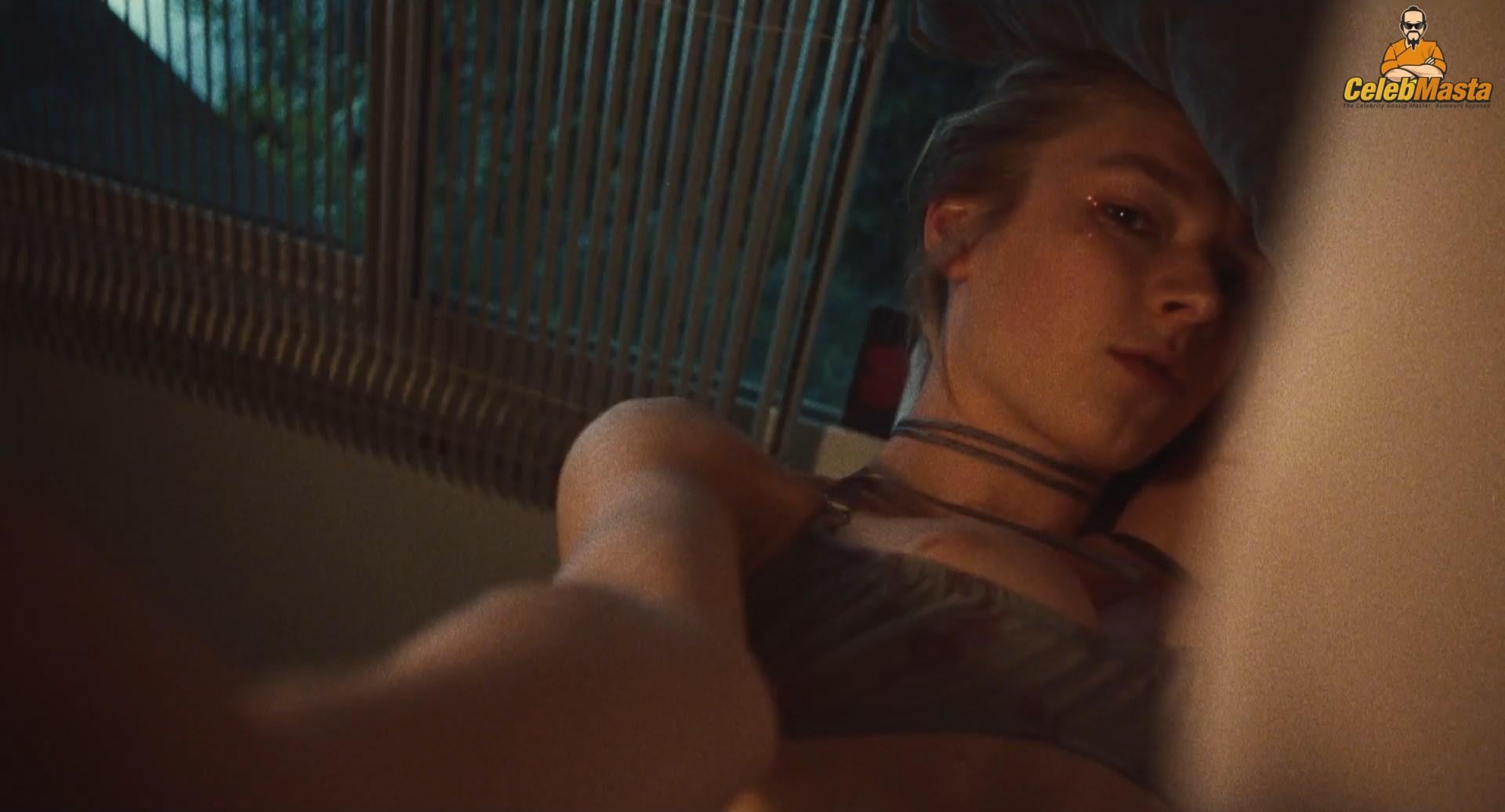 Sydney Sweeney nearly nude sheer outfit appearance. Sydney Sweeney revealing cleavage in just bra and panties showing her sexy curves.