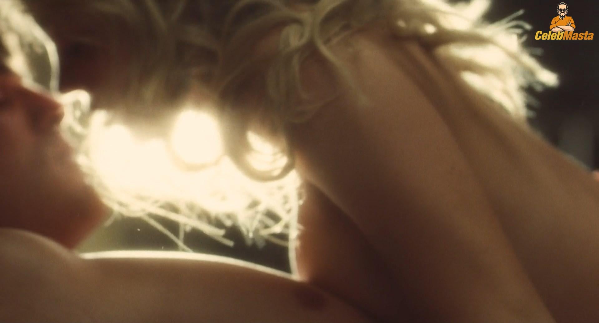 Sydney Sweeney nearly nude sheer outfit appearance. Sydney Sweeney revealing cleavage in just bra and panties showing her sexy curves.