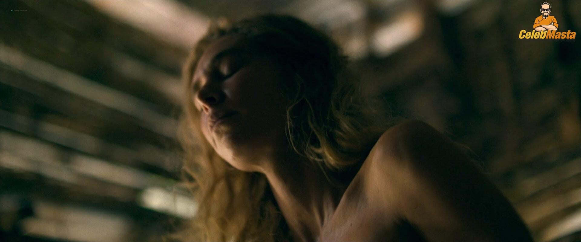 Sydney Sweeney nearly nude sheer outfit appearance. Sydney Sweeney revealing cleavage in just bra and panties showing her sexy curves.