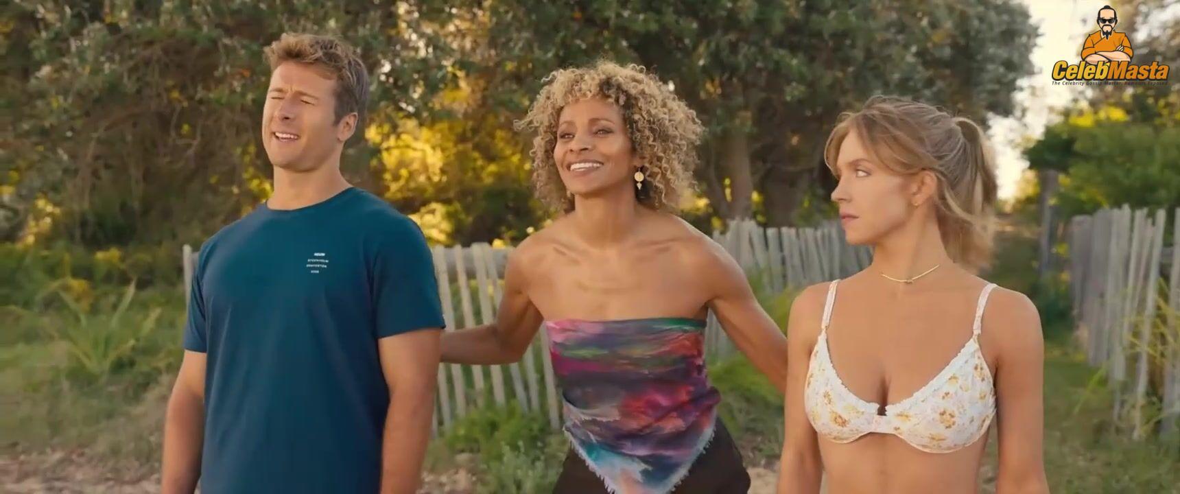 Sydney Sweeney nearly nude sheer outfit appearance. Sydney Sweeney revealing cleavage in just bra and panties showing her sexy curves.