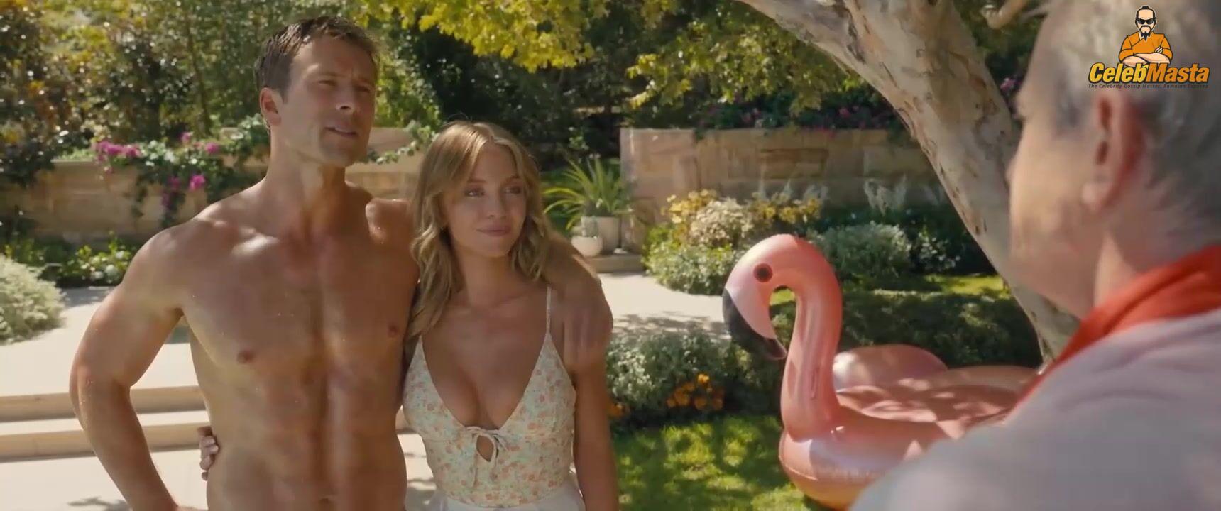 Sydney Sweeney nearly nude sheer outfit appearance. Sydney Sweeney revealing cleavage in just bra and panties showing her sexy curves.