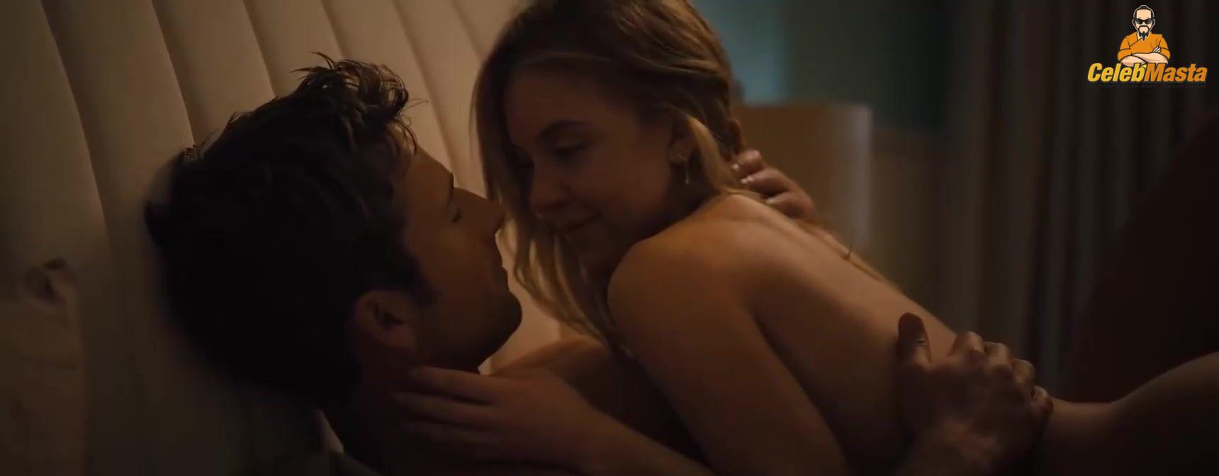 Sydney Sweeney nearly nude sheer outfit appearance. Sydney Sweeney revealing cleavage in just bra and panties showing her sexy curves.